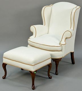 Pearson Queen Anne wing chair and ottoman with custom upholstery.