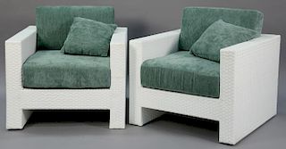 Pair of Veneman Breeze Collection bright white armchairs with teal upholstered cushions and woven exterior with powder coated