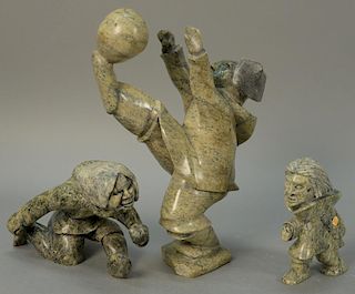 Three Inuit Eskimo figural carvings Napachie Sharky (1971) Cape Dorset serpentine Soccer Player (ht. 14 1/2in.), Napachie Ash