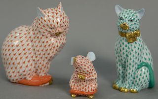 Three Herend Hungary porcelain animal figures to include a cat in green fishnet, a cat in red rust fishnet, and a mouse in re