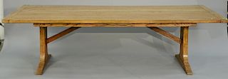 Custom oak slab top table with fish designed into top, all set on shoe foot base. ht. 30in., top: 45" x 108"