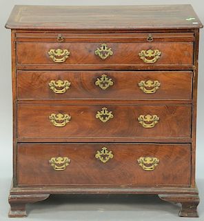 George III mahogany bachelor's chest with pull-out slide over four drawers on ogee feet. ht 32in., wd. 31in., dp. 19in. Prove