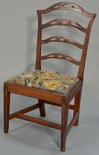 Chippendale cherry side chair having four slat ladder type back and needlepoint upholstered slip seat, set on square tapered 