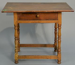 Primitive tavern table with breadboard top and drawer on turned legs, early 18th century (feet added). ht. 26 1/2in., top: 22
