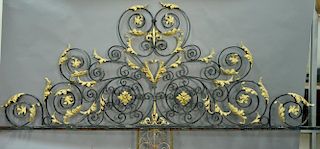 Large Victorian iron gate crest having scrolled design with gilt leaves. ht. 6'3", lg. 12'2" Provenance: Collection of Anne J