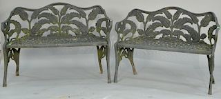 Pair of iron benches with fern motif, one marked Hinderer's Iron Works New Orleans La (one seat with short crack). ht. 30in.,