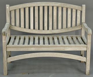 Teak bench with arms. ht. 38in., wd. 48 1/2in.