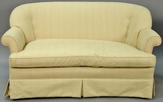 Pair of custom upholstered loveseats with four decorative pillows, very clean. ht. 37in., wd. 69in.