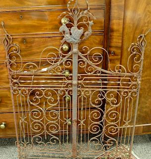 Fancy iron fence section with seahorse figure. ht. 57in., wd. 38in. Provenance: Collection of Anne Jones Willis and the late 
