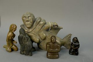Five Inuit Eskimo figural carvings to include Conlucy Nayoumealook (1891-1958) Inukjuak dark green soapstone Kneeling