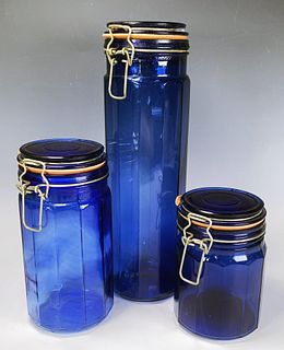 THREE GRADUATED SIZES BLUE GLASS CANISTERS 