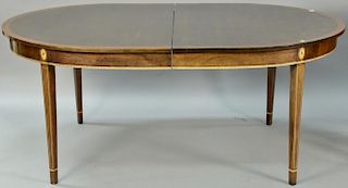 Stickley Federal style oval mahogany dining table with banded inlay top with two 16" leaves (imperfections to top). ht. 30in.