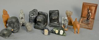 Group of fifteen Inuit Eskimo carvings by various artists to include a pair of bookends, figures, bust of men, and three carv