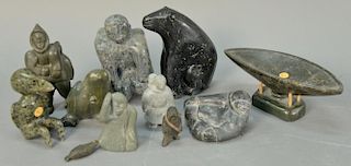 Group of ten Inuit Eskimo carvings to include serpentine Mother and Child,