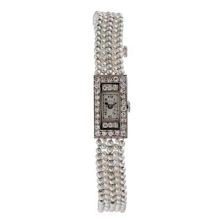 Patek Philippe Platinum, Diamond and Pearl Bracelet Watch Ca. 1927