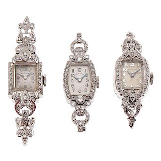 Hamilton and Hallmark Diamond Watches in 14 Karat Gold and Platinum