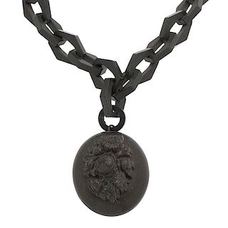 Victorian Gutta Percha Chain and Floral Carved Locket