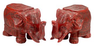(2) CHINESE RED ELEPHANT-FORM GARDEN SEATS OR STOOLS