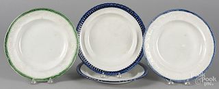 Four Staffordshire plates with green and blue borders, 10'' dia.
