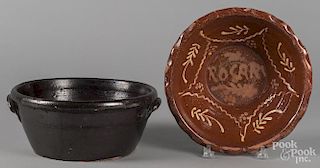 Two redware bowls, 19th c., 5'' h., 11 3/4'' dia. and 4'' h., 11 1/2'' dia.