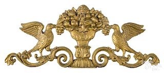 Three theater giltwood and iron decorations, to include a cast iron floral centerpiece flanked by tw
