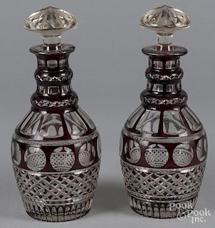 Pair of ruby cut to clear glass decanters, 11 3/4'' h.