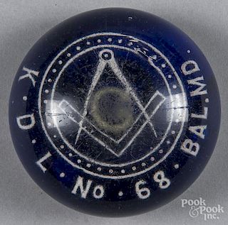 Baltimore, Maryland white frit Masonic paperweight on a translucent cobalt ground, 3 1/4'' dia.