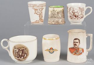 Six transfer decorated mugs and beakers of various subjects, to include Hector MacDonald, Commodore