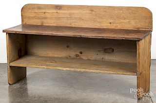 Pine bucket bench, probably constructed from old elements, 26 3/4'' h., 47 3/4'' w.