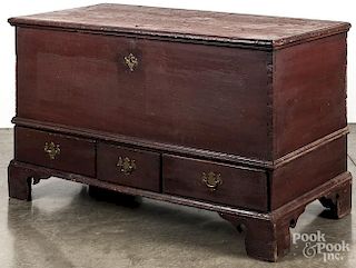 Pennsylvania painted poplar dower chest, late 18th c., retaining a later red surface, 29'' h., 47'' w.