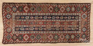 Kazak carpet, early 20th c., 7'9'' x 3'8''.