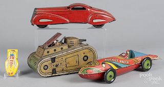 Three Marx tin litho wind - up toys, to include a Rocket Racer, 16'' l., a tank and a coupe, togeth