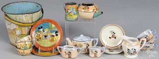 Mickey Mouse child's porcelain tea set, to include nine pieces, together with a seven piece tin lith