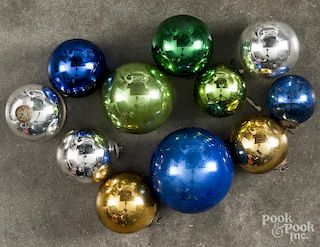 Group of eleven glass kugel Christmas ornaments with embossed caps, largest - 2 1/2'' dia.