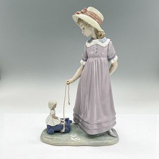 Lladro Porcelain Figurine, Girl with Toy Wagon 1005044