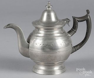 Beverley, Massachusetts pewter teapot, 19th c., bearing the touch of Eben Smith, with engraved flora