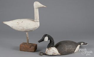 Two carved and painted decoys.