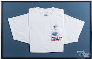 Pair of framed t-shirts listing Curt Schilling's 319 strike outs, one signed.