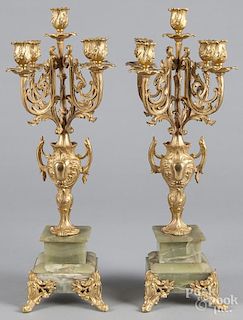 French gilt bronze and marble three-piece clock garniture, ca. 1900, 23'' h. and 21'' h.