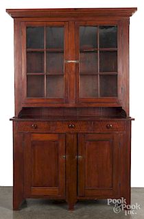 Pennsylvania stained poplar Dutch cupboard, 19th c., with tiger maple drawers, retaining an old red