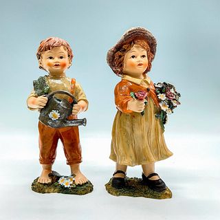 Pair of Vintage Hand Painted Resin Figurines