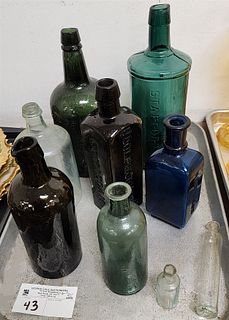 Tray 9 Vintage Bottles- Stafford's Ink, Congress + Empire Spring Co, Schniedam Udolphowolfe's Aromatic Schnapps, Ayer's Hair Vigor, Etc