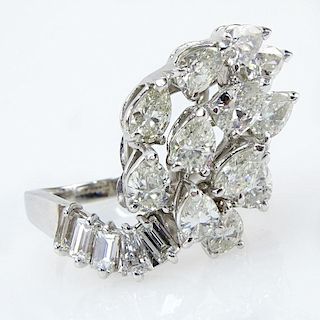 4.5 Carat Pear and Baguette Cut Diamond and 18 Karat White Gold Ring.