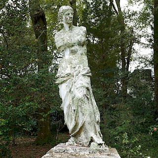 Life-size antique cast iron garden figure