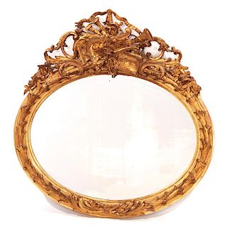 Large Continental Rococo giltwood oval mirror