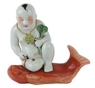 Chinese Porcelain Figure of Boy Riding a Fish