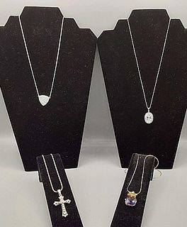 4 Necklaces with Sparkling Pendants