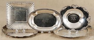 Five sterling silver trays, early 20th c., of various makers, largest - 12'' dia., 74.6 ozt.