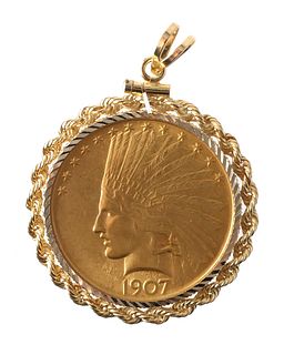 1907 US $10 GOLD COIN IN 14K BEZEL