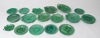 Large Group of Green Majolica Plates and Table Articles